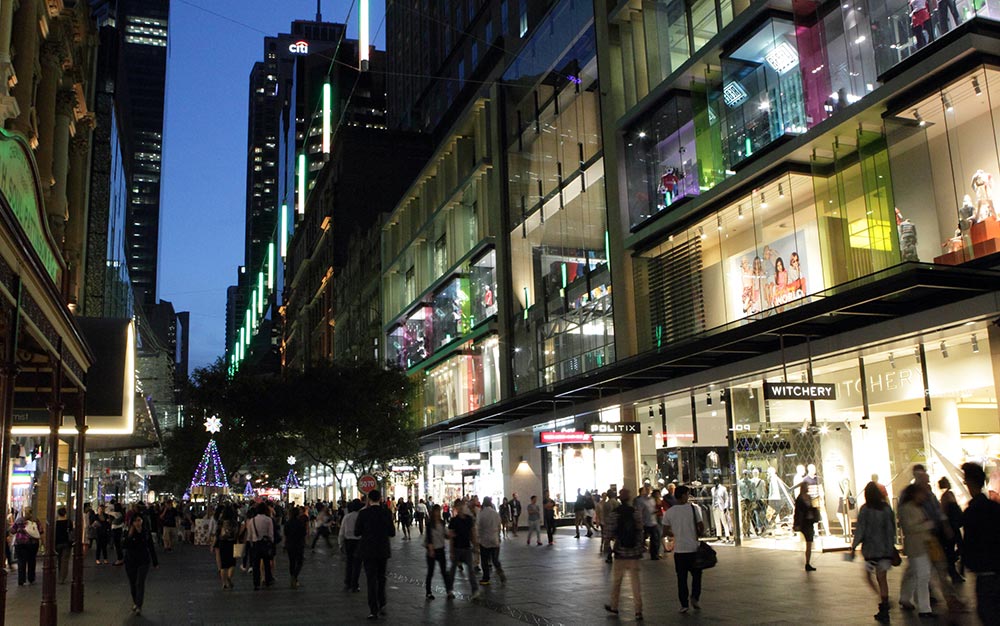 The Pitt Street Mall catenary lighting system illuminates the pedestrian areas below and the facades of the buildings, without needing large self-standing poles or heavy-looking supports