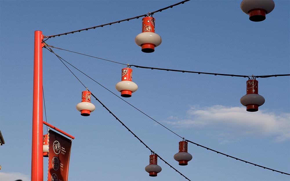Brisbane Chinatown catenary lighting system with custom made light fittings