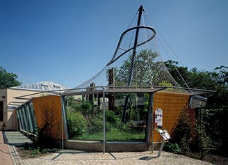 The wire mesh Marmoset Monkey enclosure at Halle Zoo in Germany perfectly illustrates why Carl Stahl X-TEND stainless steel cable mesh is so appealing for use in zoological enclosures