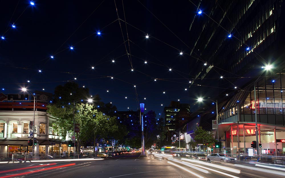 “Lonsdale Gateway”, the Ronstan catenary lighting structure at the intersection of Lonsdale and Russell Streets in Melbourne, celebrates entry into the city’s Greek precinct