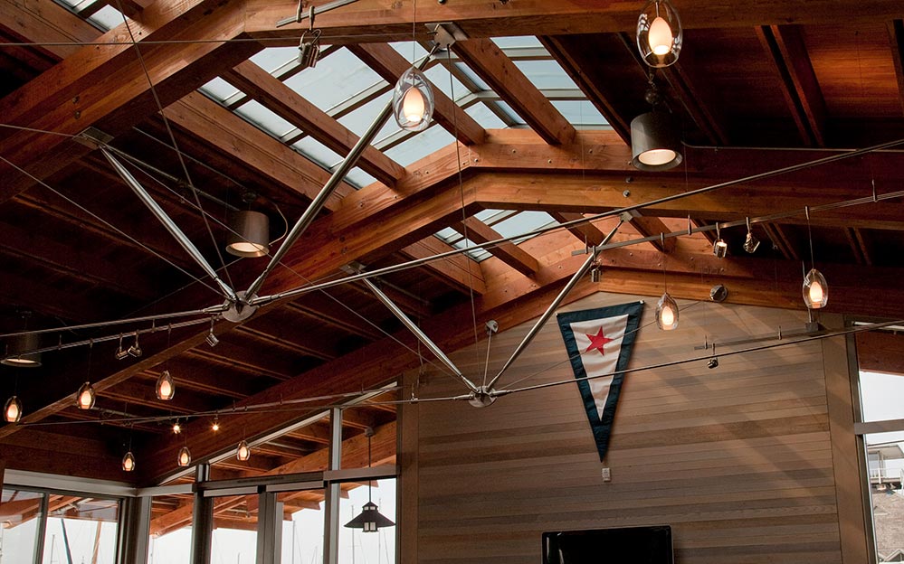 Ronstan Tensile Architecture provides sleek architectural tension rod systems to the San Diego Yacht Club’s new Malin Burnham Sailing Center in San Diego, CA. The systems, which act as cross bracing and web compression struts, brace the Center’s timber roof trusses.