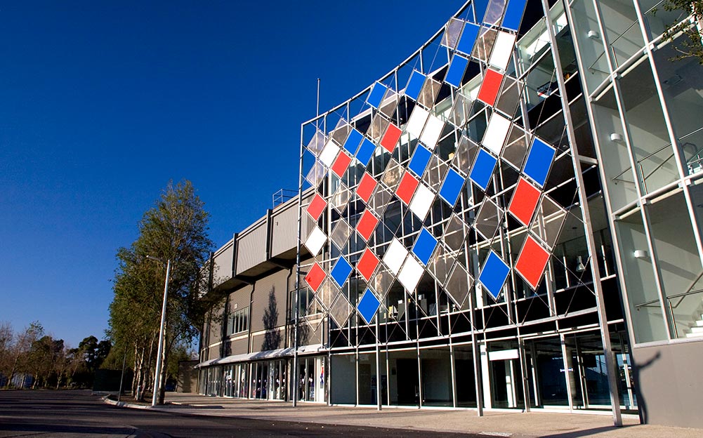 A series of floating panels display the team colours of the grounds home AFL team, the Western Bulldogs. The façade feature runs from the first floor to the roof acting as a gateway for supporters.