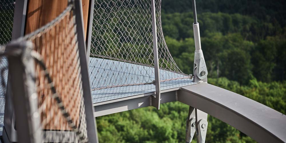 Tensile mesh complying with design codes and building standards